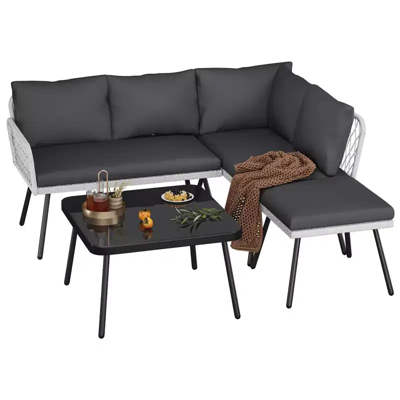 Set di mobili da esterno a L in vimini, divano sezionale da patio a 4 pezzi con rattan fatto a mano, set divano da conversazione con tavolino da caffè, pouf per giardino